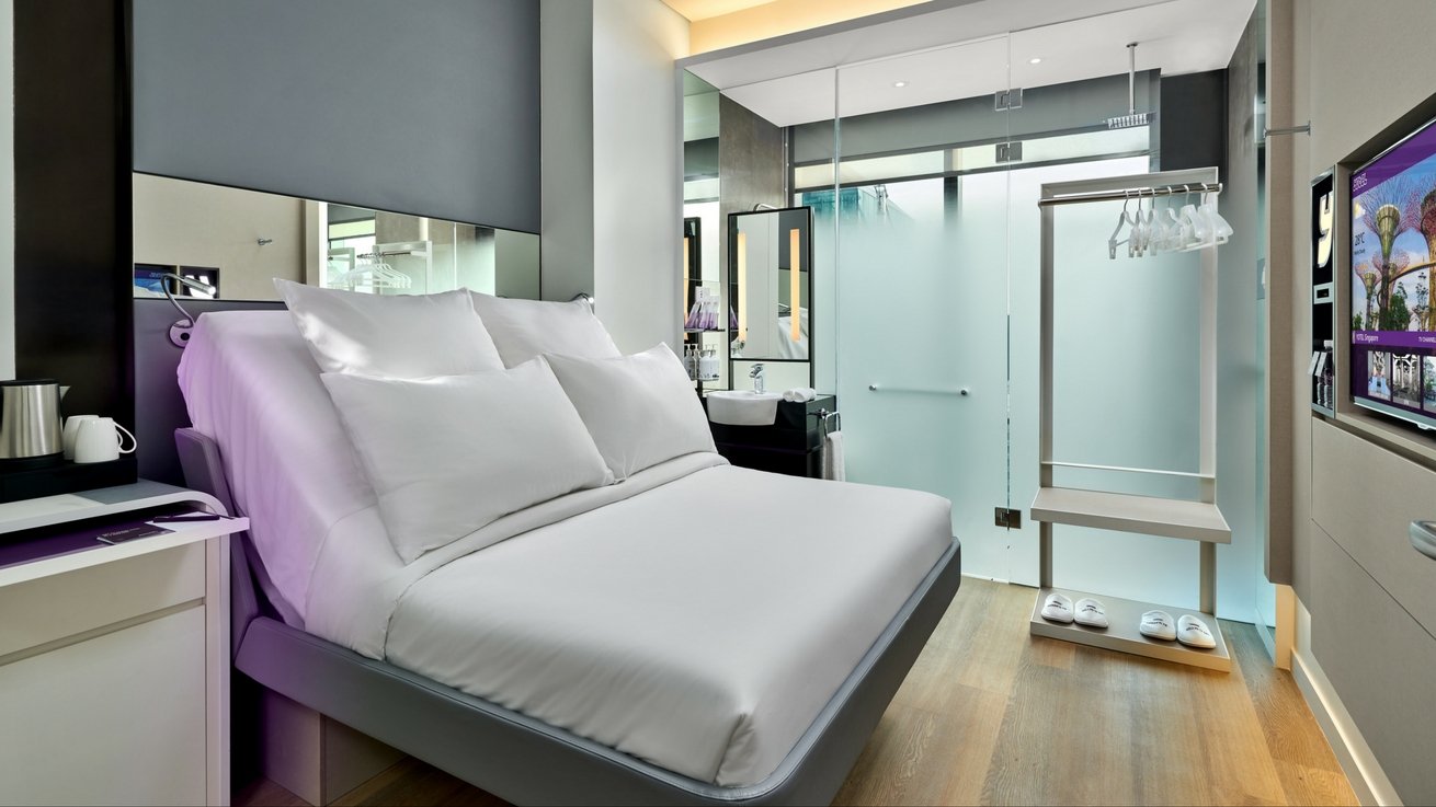 Clever use of space and technology inside a Premium Queen room at the Yotel Singapore. Click to enlarge.