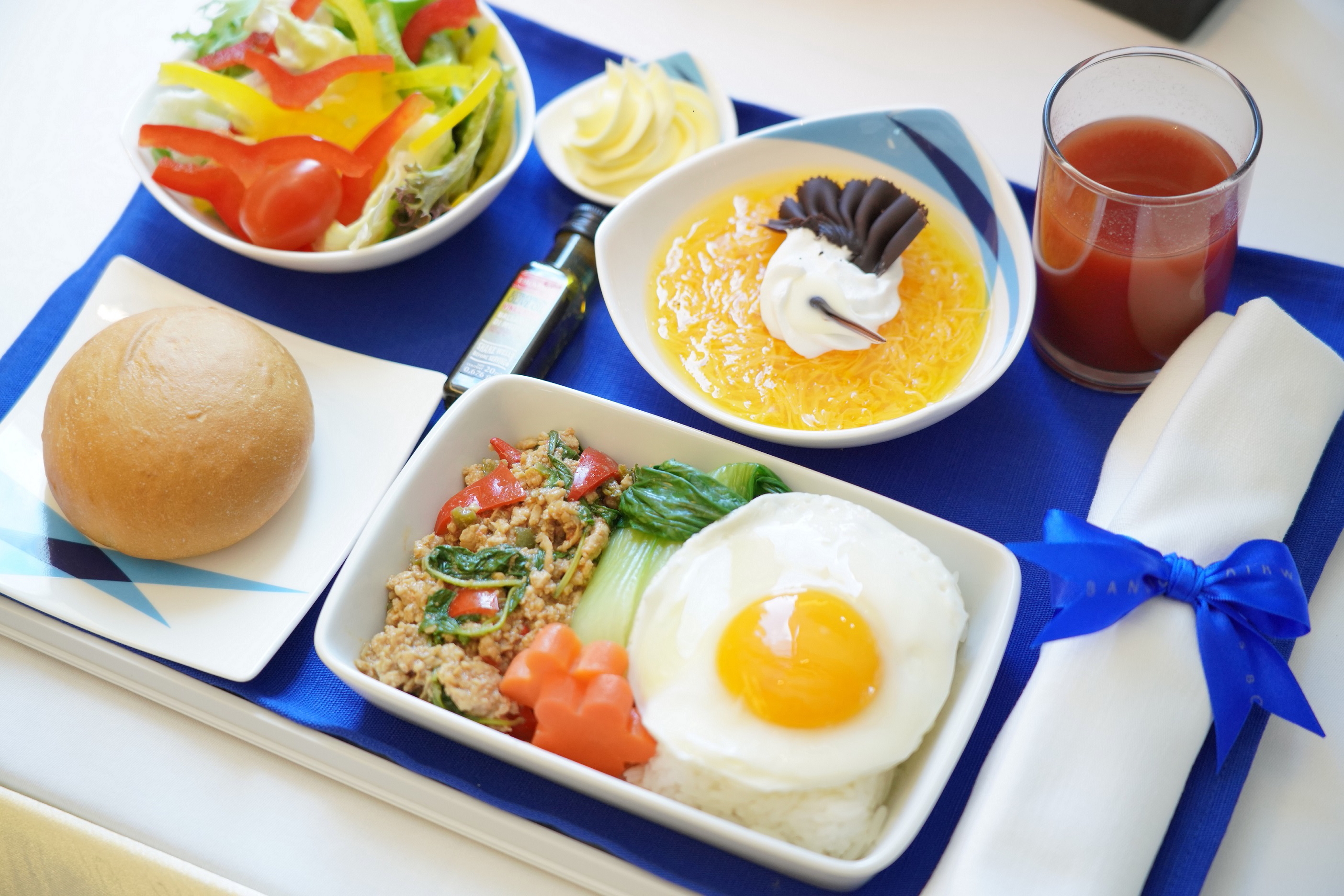 Bangkok Airways has enhanced its inflight food service with “Boutique Street Food” menus. The new menus will be available on all Bangkok Airways flights, domestic and international, originating from Suvarnabhumi, Samui and Phuket Airports. Click to enlarge.