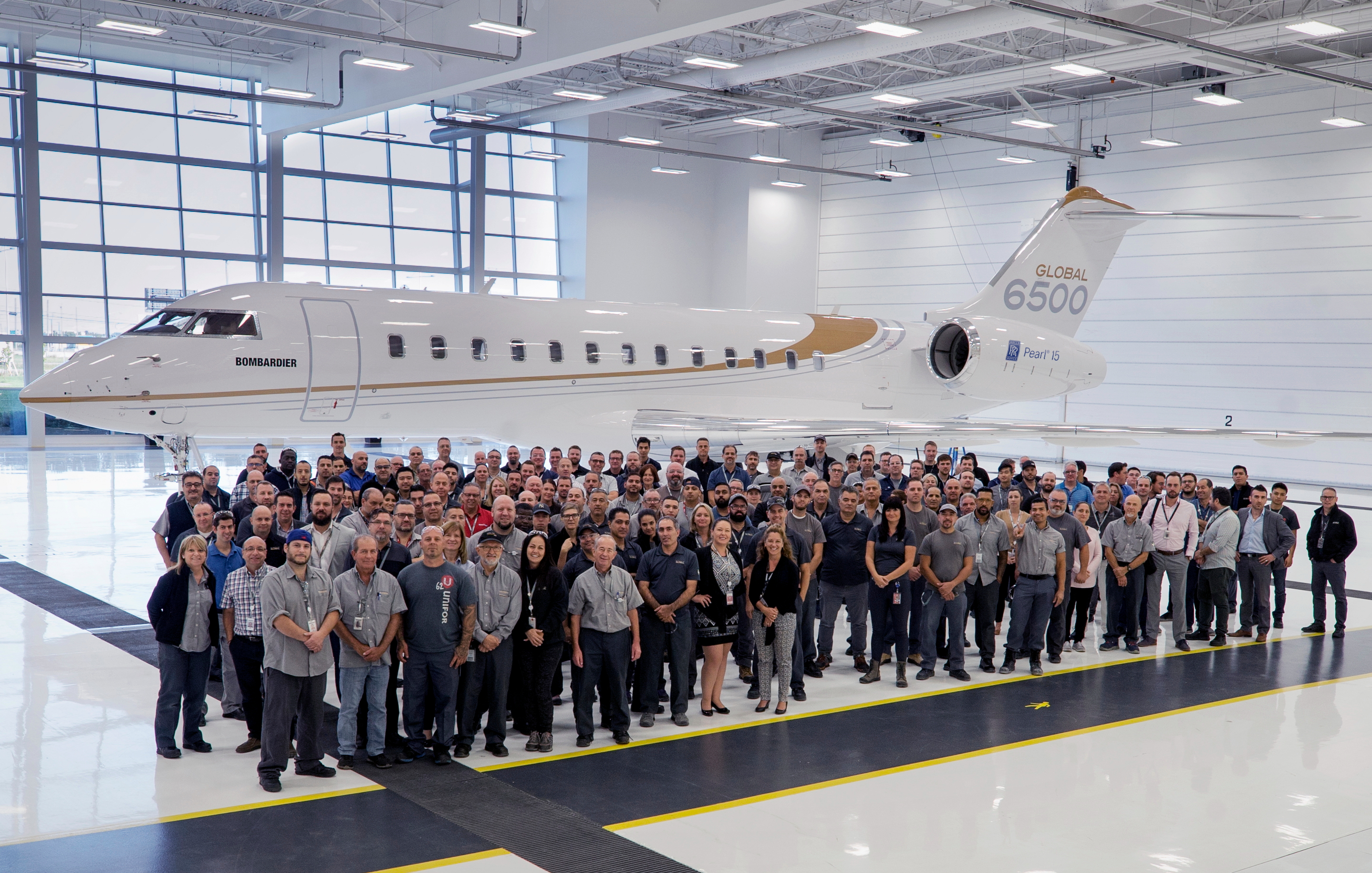 Team Bombardier with a Global 6500 aircraft in the background. Click to enlarge.