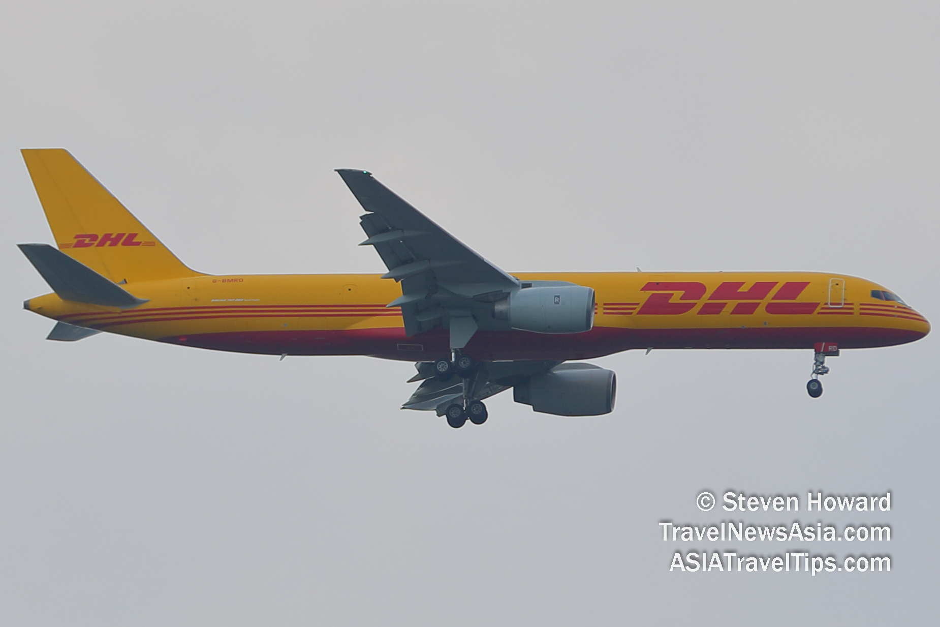 DHL Boeing 757 reg: GBMRD. Picture by Steven Howard of TravelNewsAsia.com Click to enlarge.