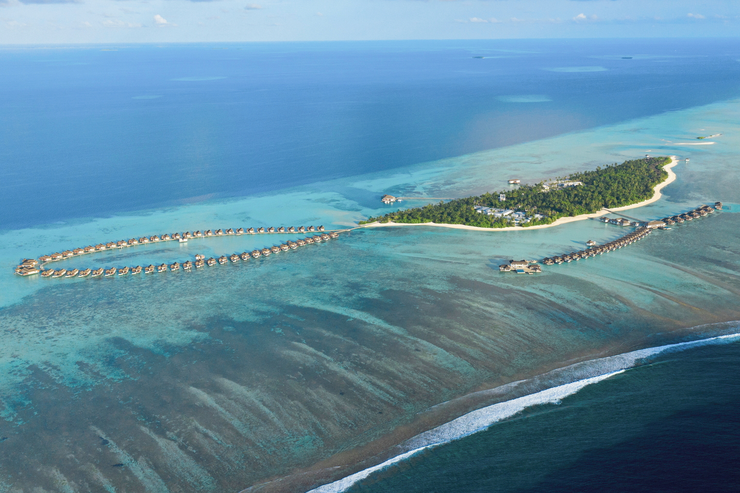 Set amidst 18 hectares of lush tropical flora and fauna on the Gaafu Alifu Atoll, the Pullman Maldives Maamutaa Resort is an all-inclusive resort that boasts 122 villas, including two exclusive Aqua Villas featuring bedrooms submerged beneath the turquoise waters. Click to enlarge.