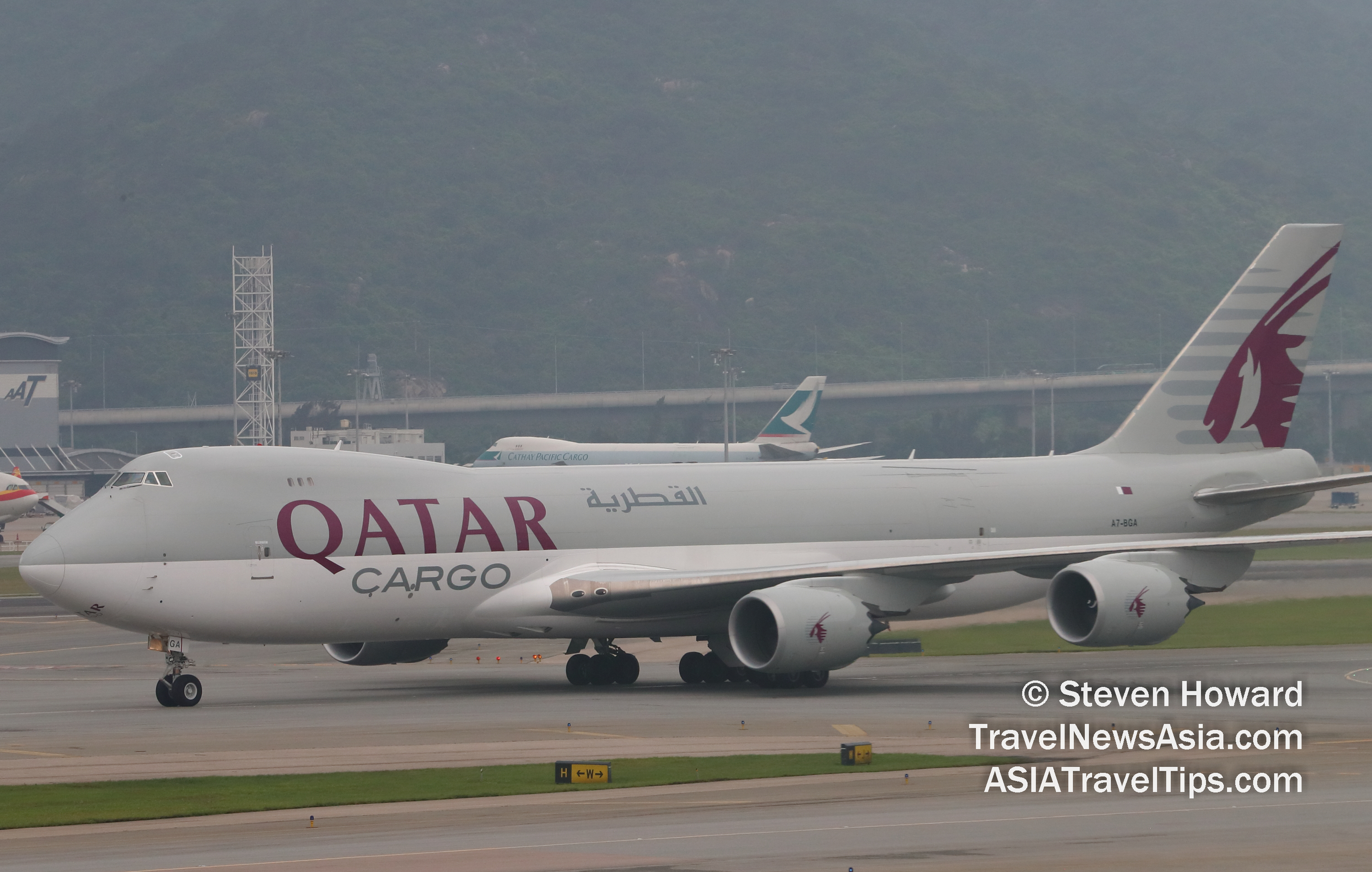 Qatar Airways Boeing 747-8F reg: A7-BGA at HKIA. Picture by Steven Howard of TravelNewsAsia.com Click to enlarge.