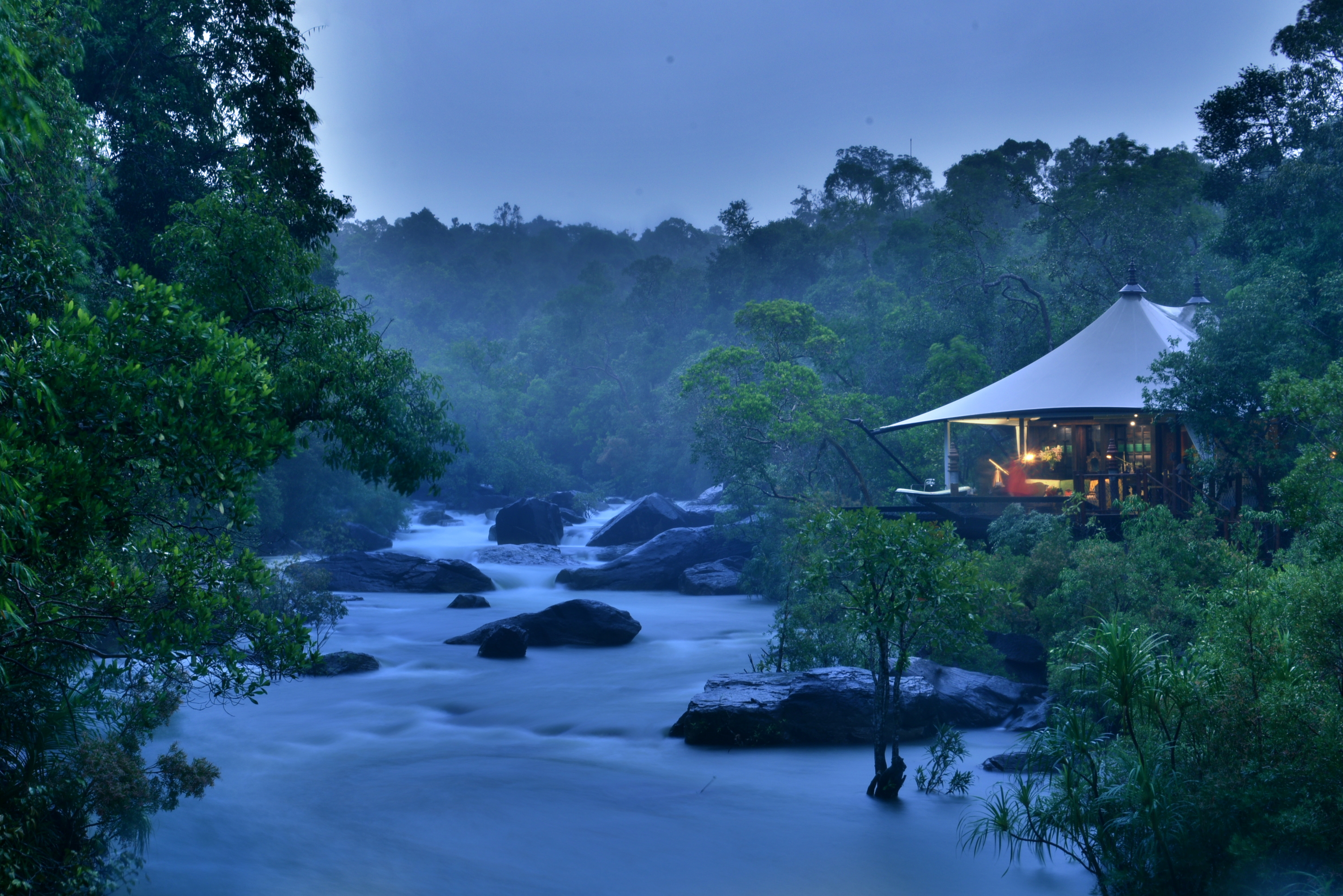 Perched over 1.5km of river and waterfalls, the 14 one-bedroom tents (100sqm) and one two-bedroom tent (140sqm) have been designed to evoke Bensley’s vision of what it might have been like to be on a luxury safari in the jungles of Cambodia with Jacky O’, who travelled throughout the Kingdom with King Sihanouk in 1967. Click to enlarge.