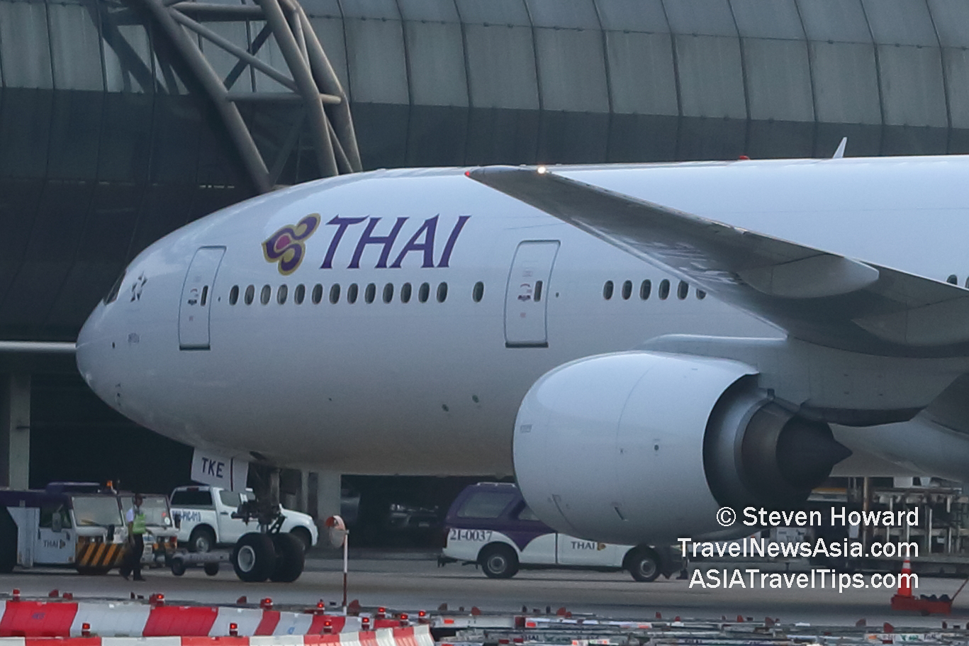 Thai Airways Boeing 777 reg: HS-TKE at Suvarnabhumi Airport near Bangkok, Thailand. Picture by Steven Howard of TravelNewsAsia.com Click to enlarge.